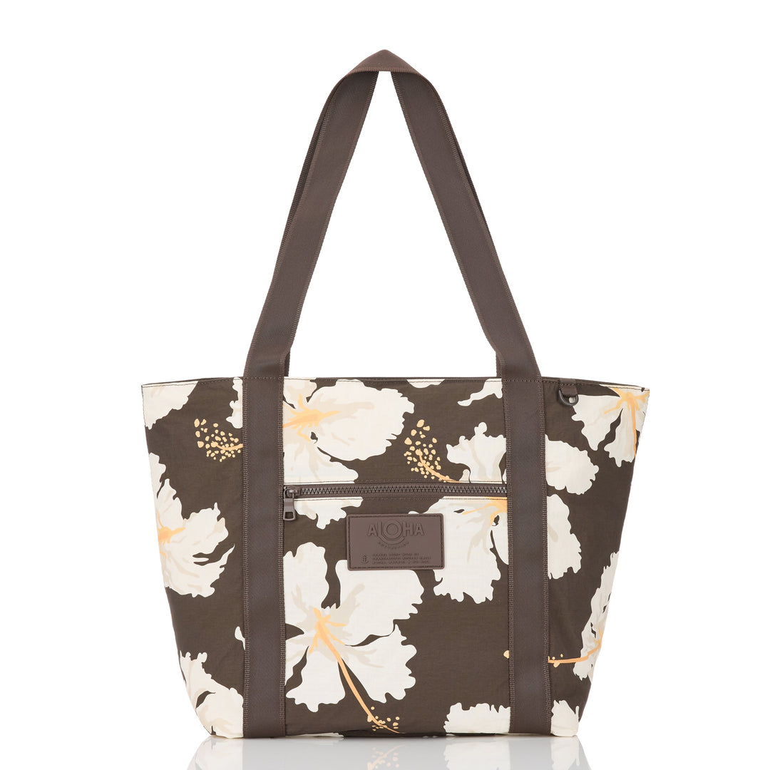 Chocolate-brown Keep It Light zipper tote with large cream hibiscus blooms, brown straps and an exterior zipper pocket, front view