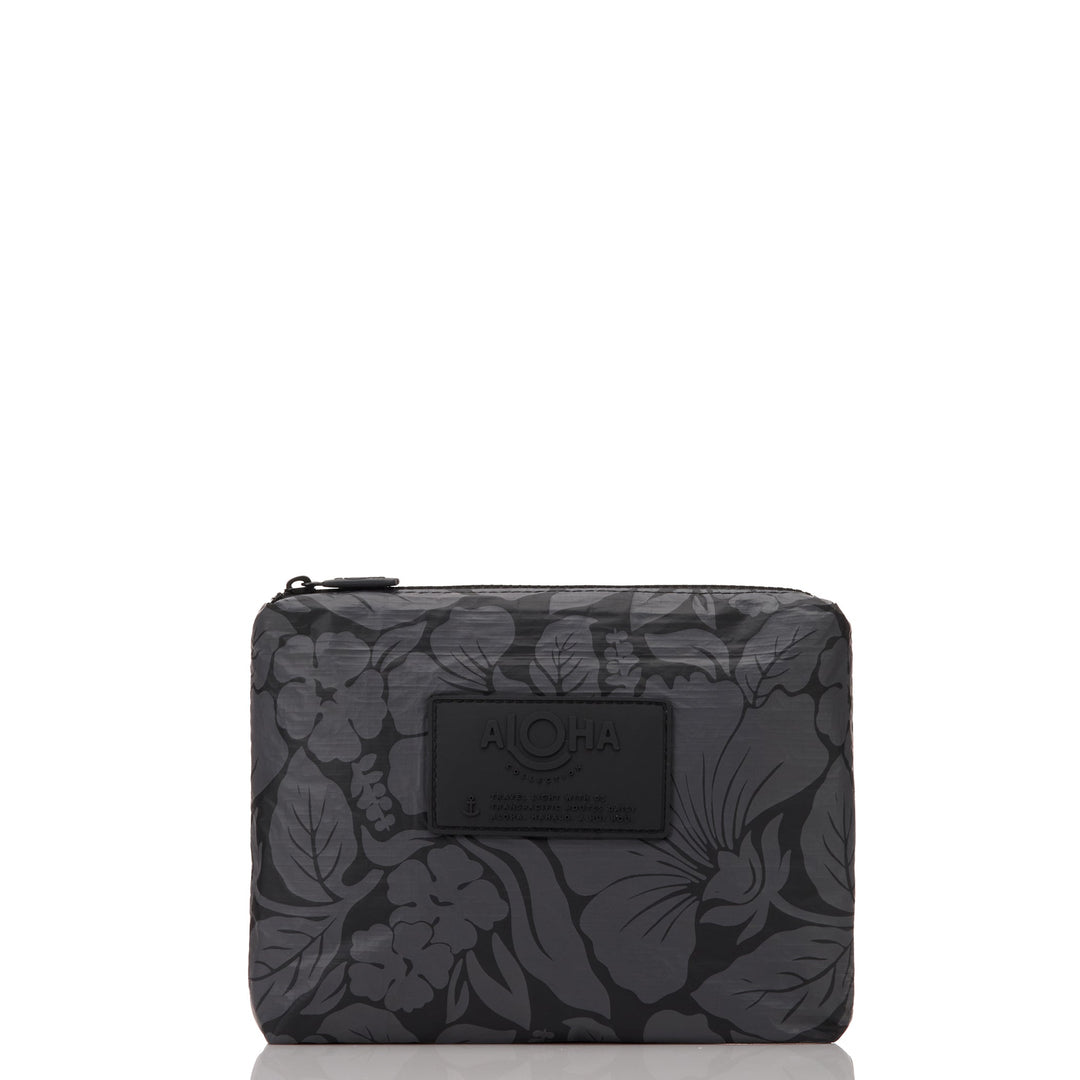 Black Heipua Small Pouch with a tonal charcoal hibiscus and leaf print, front view with the ALOHA patch