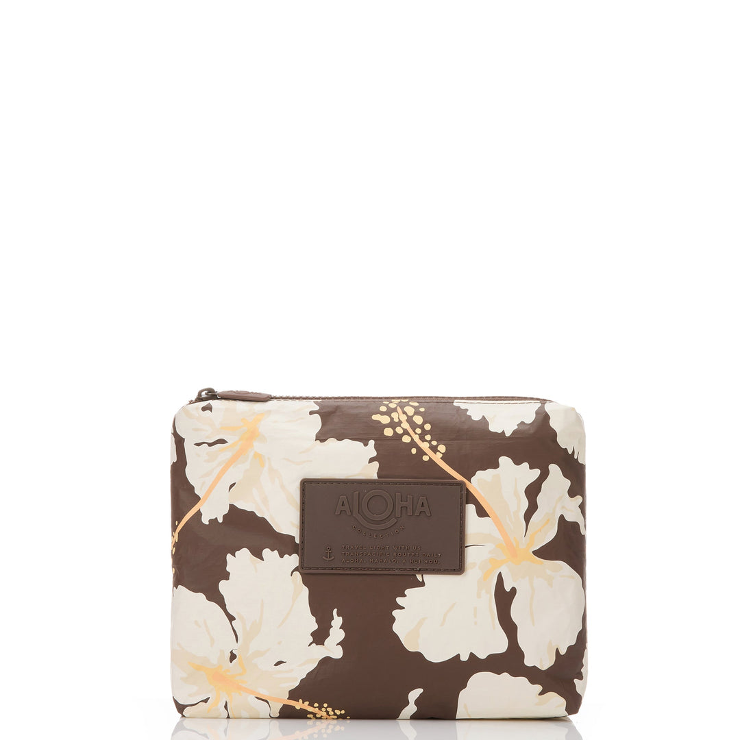 Brown Tahaa Small Pouch with large cream hibiscus blooms, front view with the brown ALOHA patch