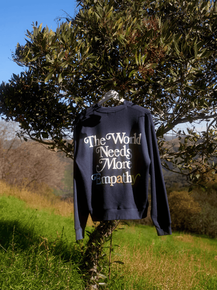 The Mayfair Group - World Needs More Empathy Waffle Classic Crewneck - Jayden P Boutique