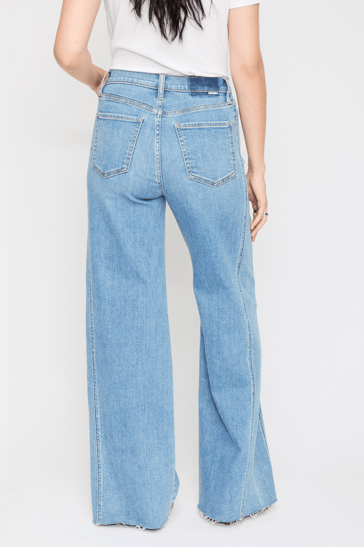 Daze Denim Far Out Seamed Wide Leg Jeans in Make Believe — studio back view with back pockets | Jayden P Boutique
