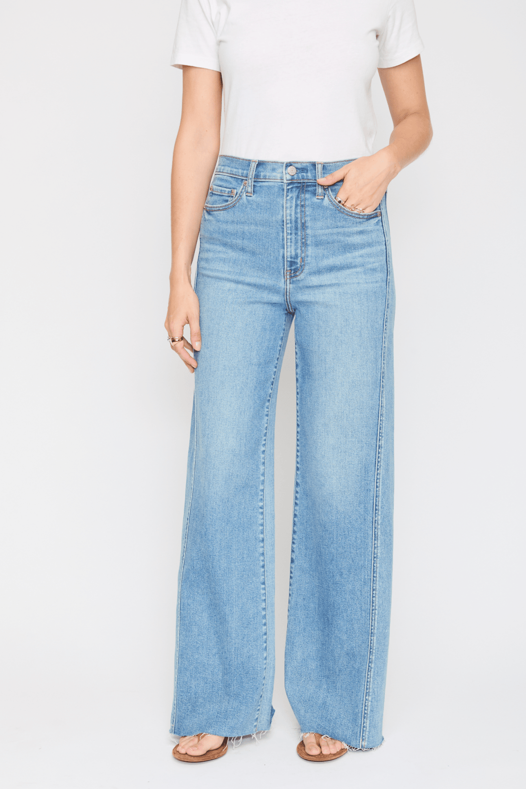 Daze Denim Far Out Seamed Wide Leg Jeans in Make Believe — studio front view of paneled seaming and raw hem | Jayden P Boutique