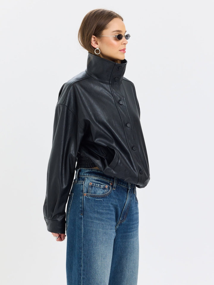 Daze Denim Phantom Faux Leather Jacket in Black — side profile showing funnel neckline | Jayden P Boutique