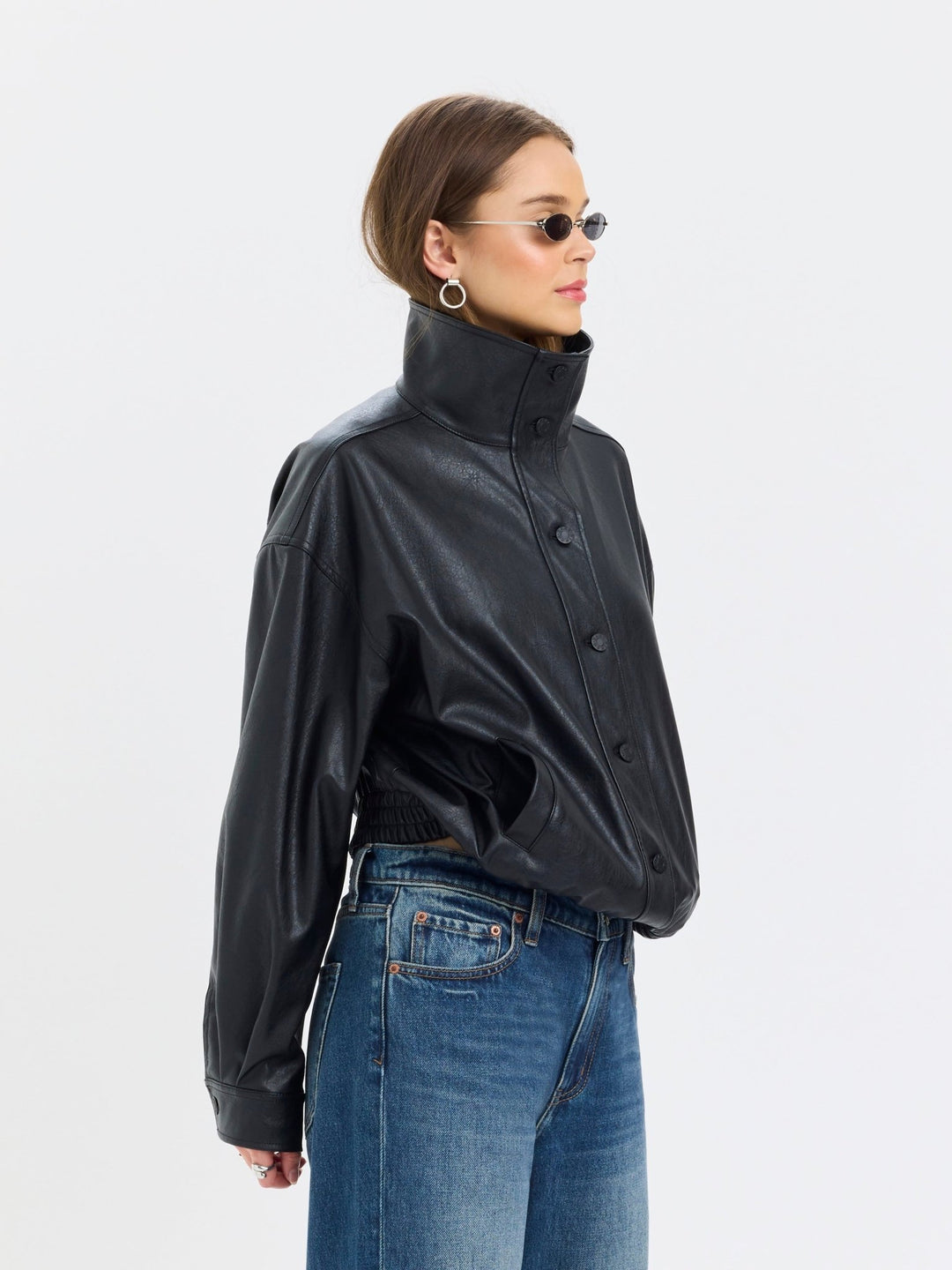 Daze Denim Phantom Faux Leather Jacket in Black — side view of oversized hip-length fit | Jayden P Boutique
