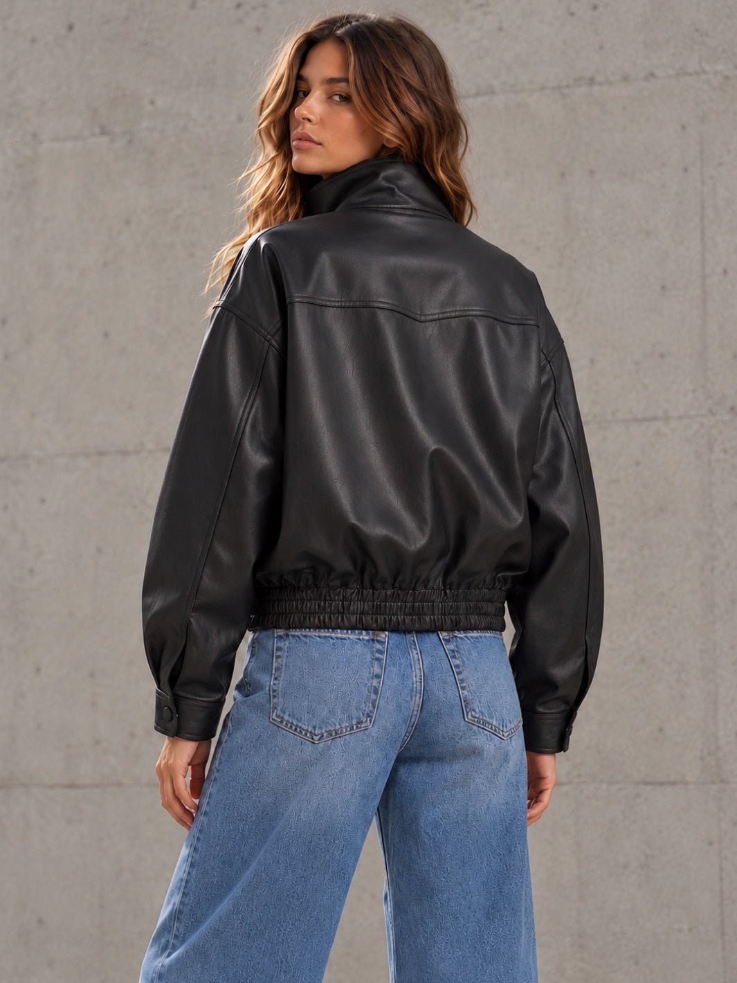 Daze Denim Phantom Faux Leather Funnel Neck Jacket in black — back view