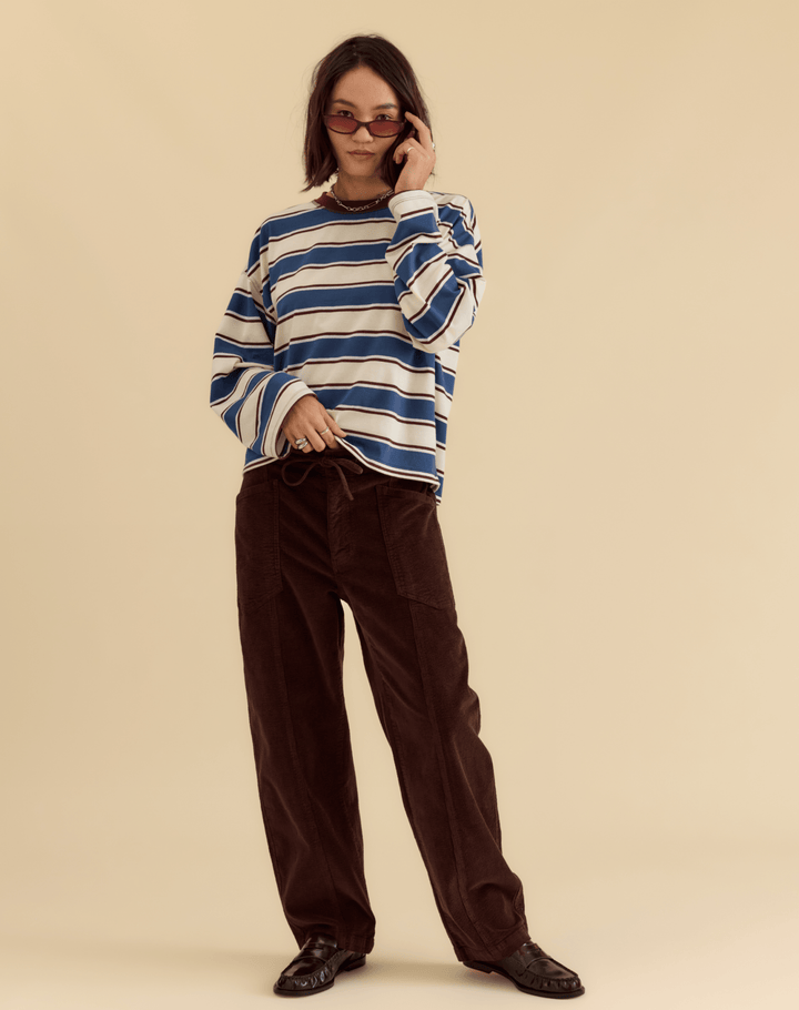 Daze Denim Villa Corduroy Drawstring Barrel Pants in Chocolate — full-length front view styled with striped sweater and loafers | Jayden P Boutique