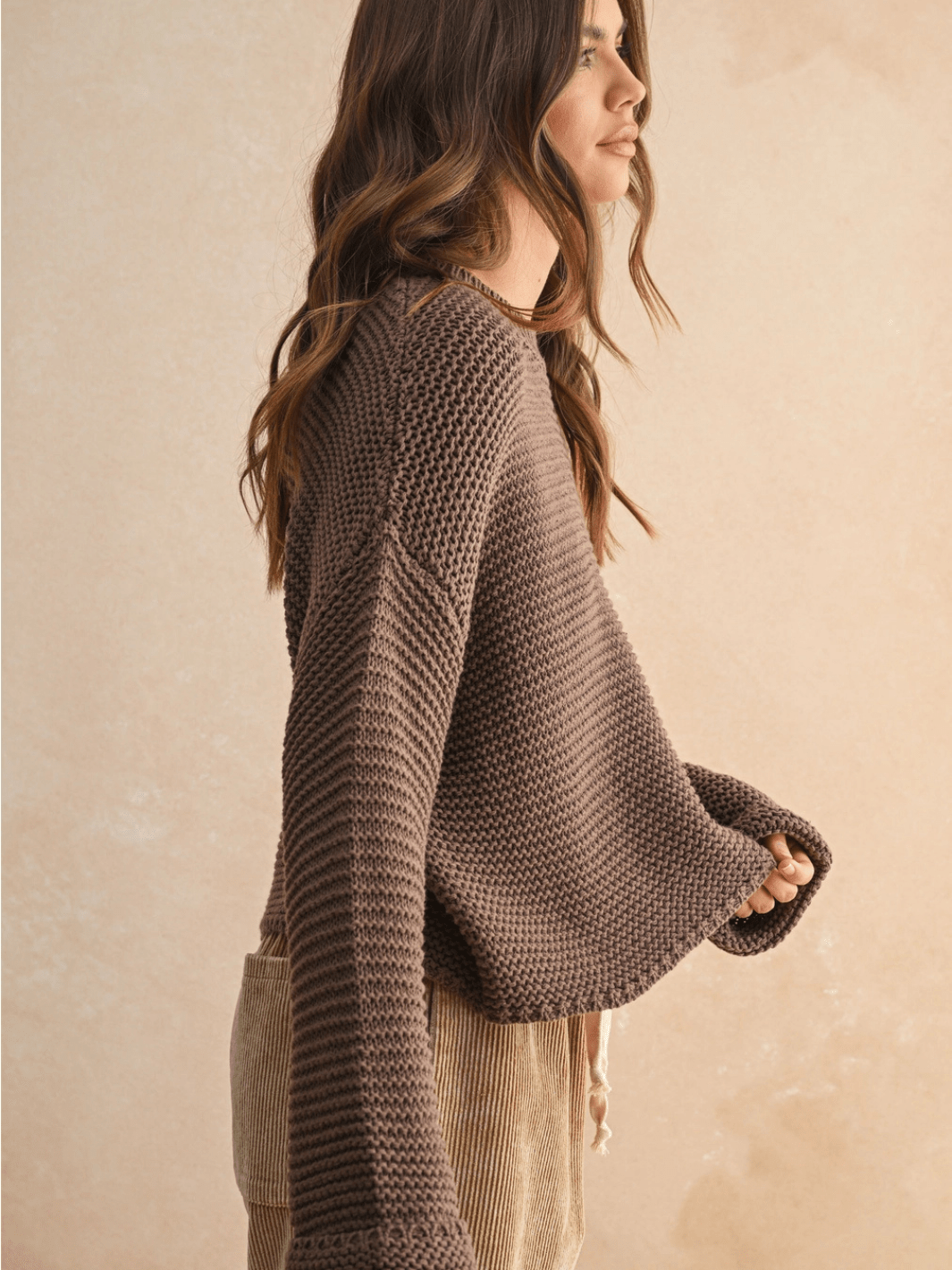 Laid-Back Luxe Chunky Knit Top in warm brown with relaxed oversized fit and round neckline, worn by a model.