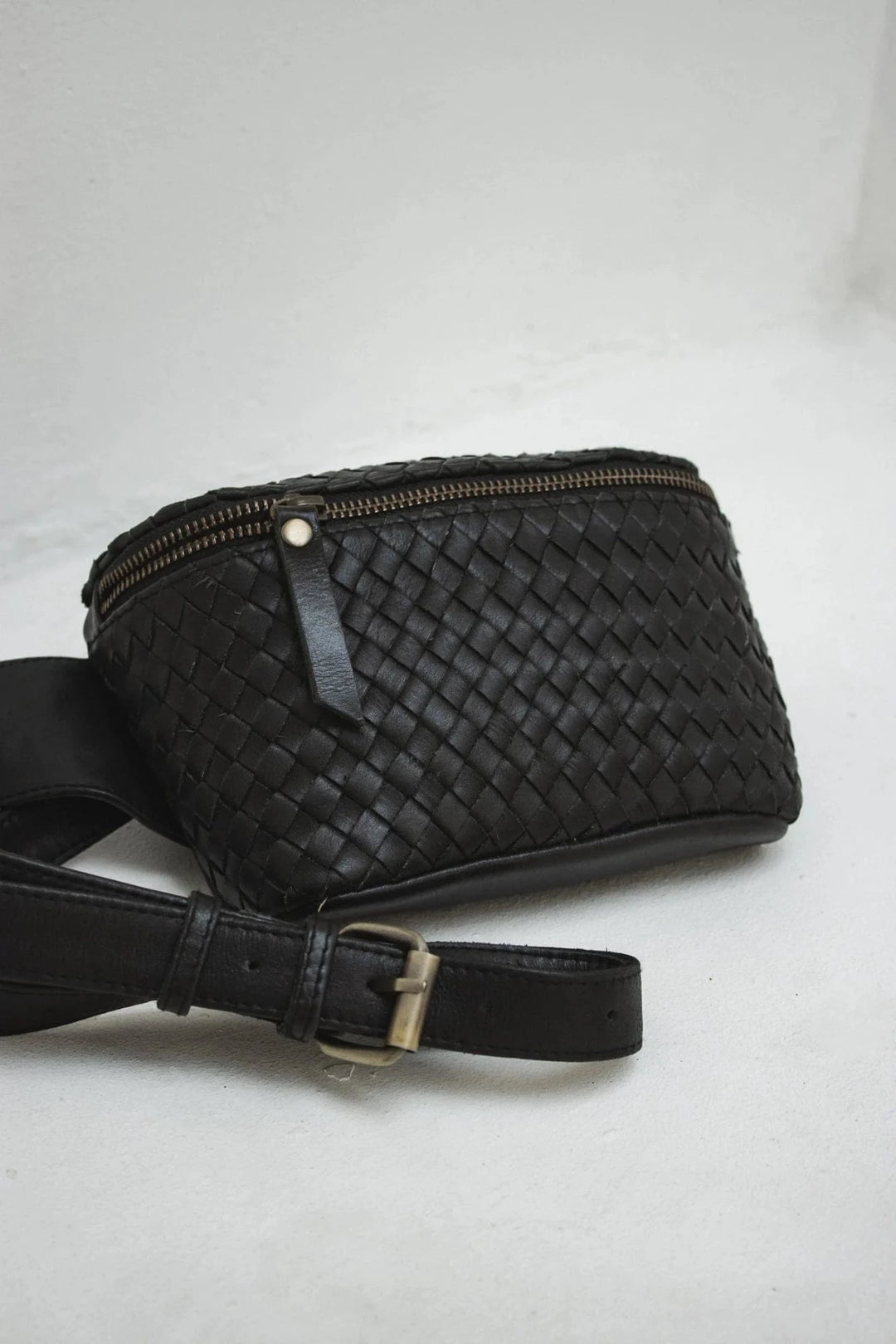 REMY WOVEN LEATHER FANNY PACK #color_black Carlsbad shops. Carlsbad boutiques. 